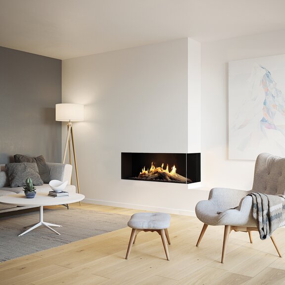 Gas-Kamineinsatz VISIO 100 mit Zweiseitigem Glas in grossem Wohnraum