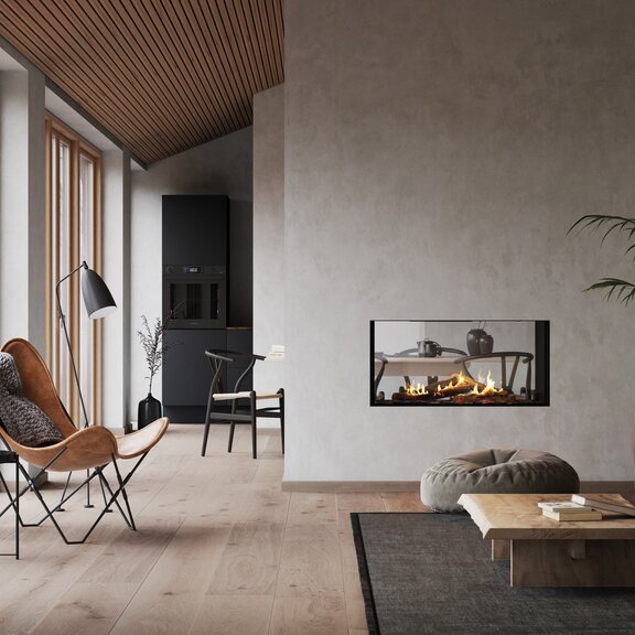 Gas-Kamineinsatz VISIO 100 Tunnel mit schwarzem Stahlrahmen trennt Wohnzimmer und Esszimmer