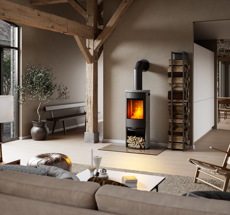 Holz-Kaminofen CARO 120 mit Specksteinverkleidung in rustikalem Haus