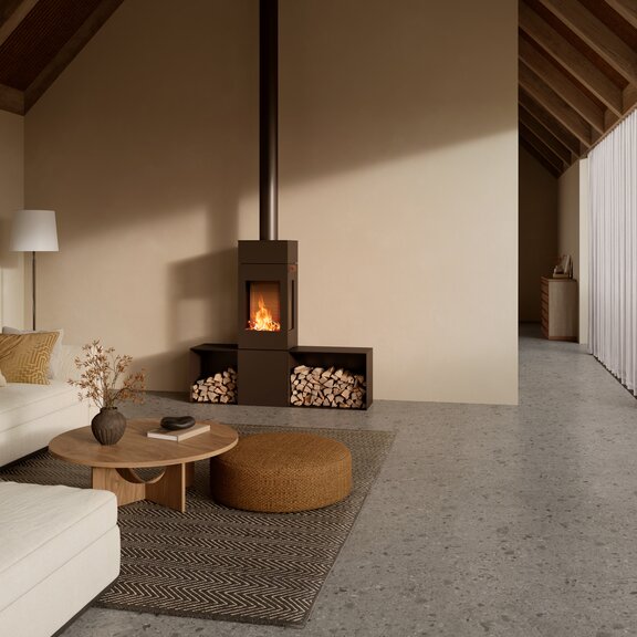 Holz-Kaminofen NEXO 140 in der Farbe Mokka im schlichten und hellen Wohnzimmer