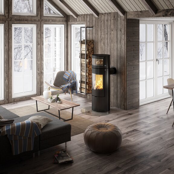 Holz-Kaminofen VIVA L Back in Schwarz mit integriertem Backfach, in welchem mit Feuerwärme frisches Brot gebackt wird