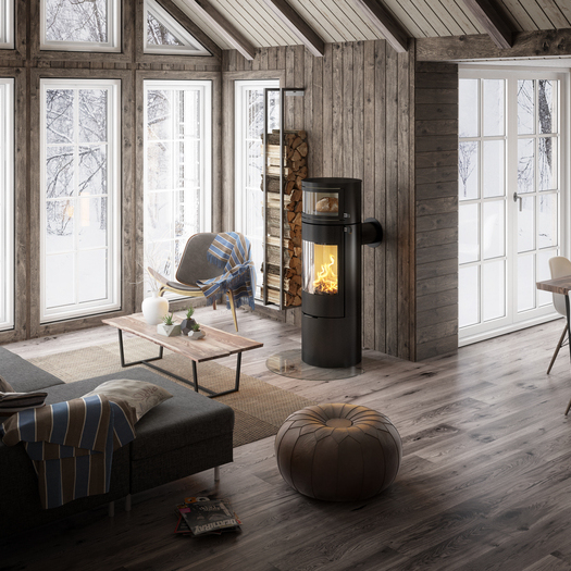 Holz-Kaminofen VIVA L Back in Schwarz mit integriertem Backfach, in welchem mit Feuerwärme frisches Brot gebackt wird