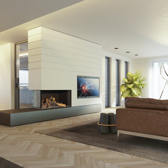 Gas-Kamin GP115/55R auf schwarzem Sockel und mit weisser Verkleidung im geräumigen Wohnzimmer mit Sofa