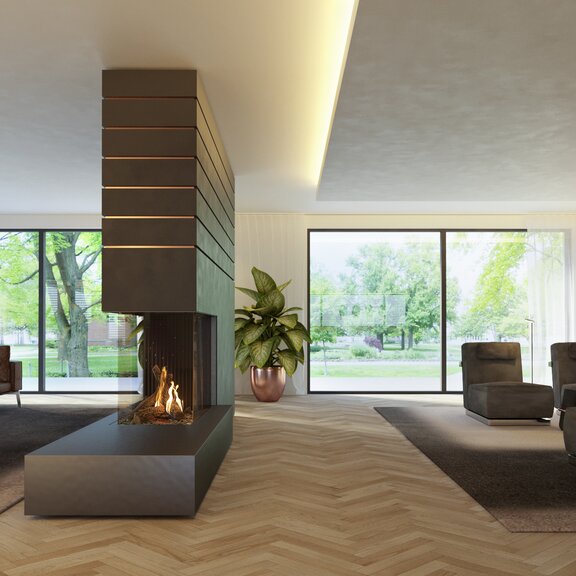 Gas-Kamin GP115/75R auf schwarzem Sockel und mit dunkler Verkleidung als Raumteiler zwischen zwei Wohnbereichen mit grossen Fensterfronten